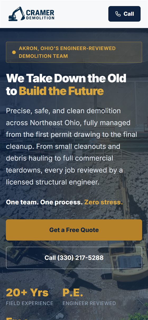 The same Cramer Demolition homepage on a phone, with a tap-to-call button in the header.